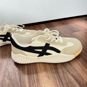 Cream & Black Low-Top Sneaker with Yellow Toe Accent